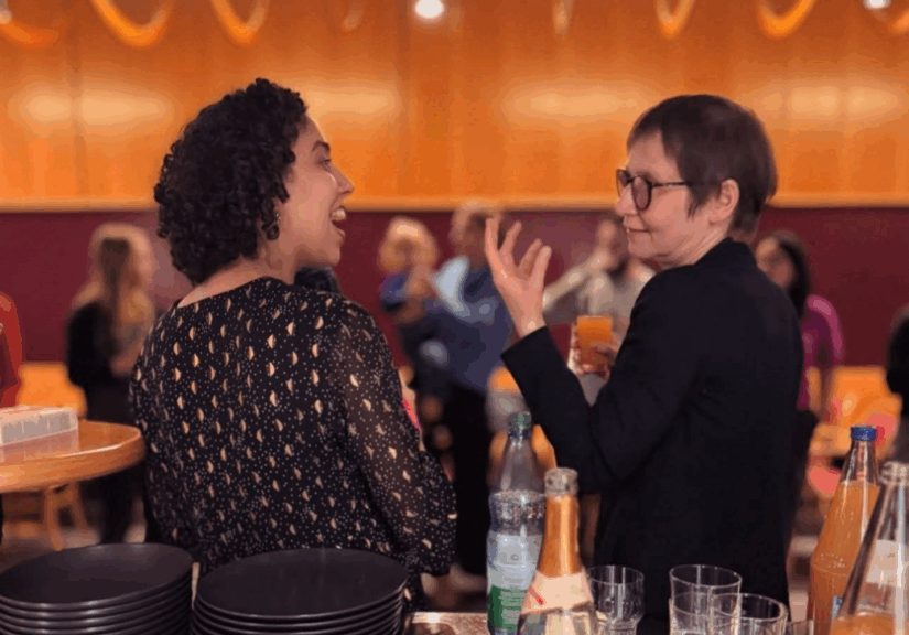 2026 FAU CHREN New Year Gathering. 2 women talking.